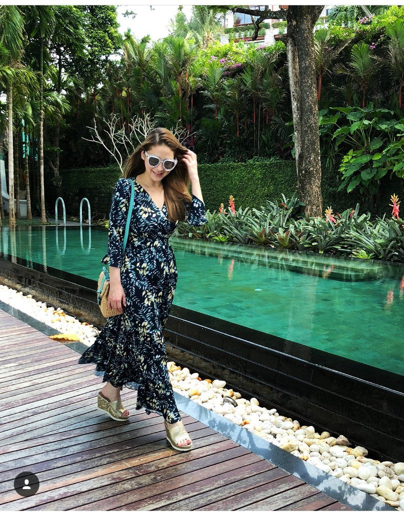 Natalie enjoyed her holiday with Turquoise Mini VIPHA wicker bag