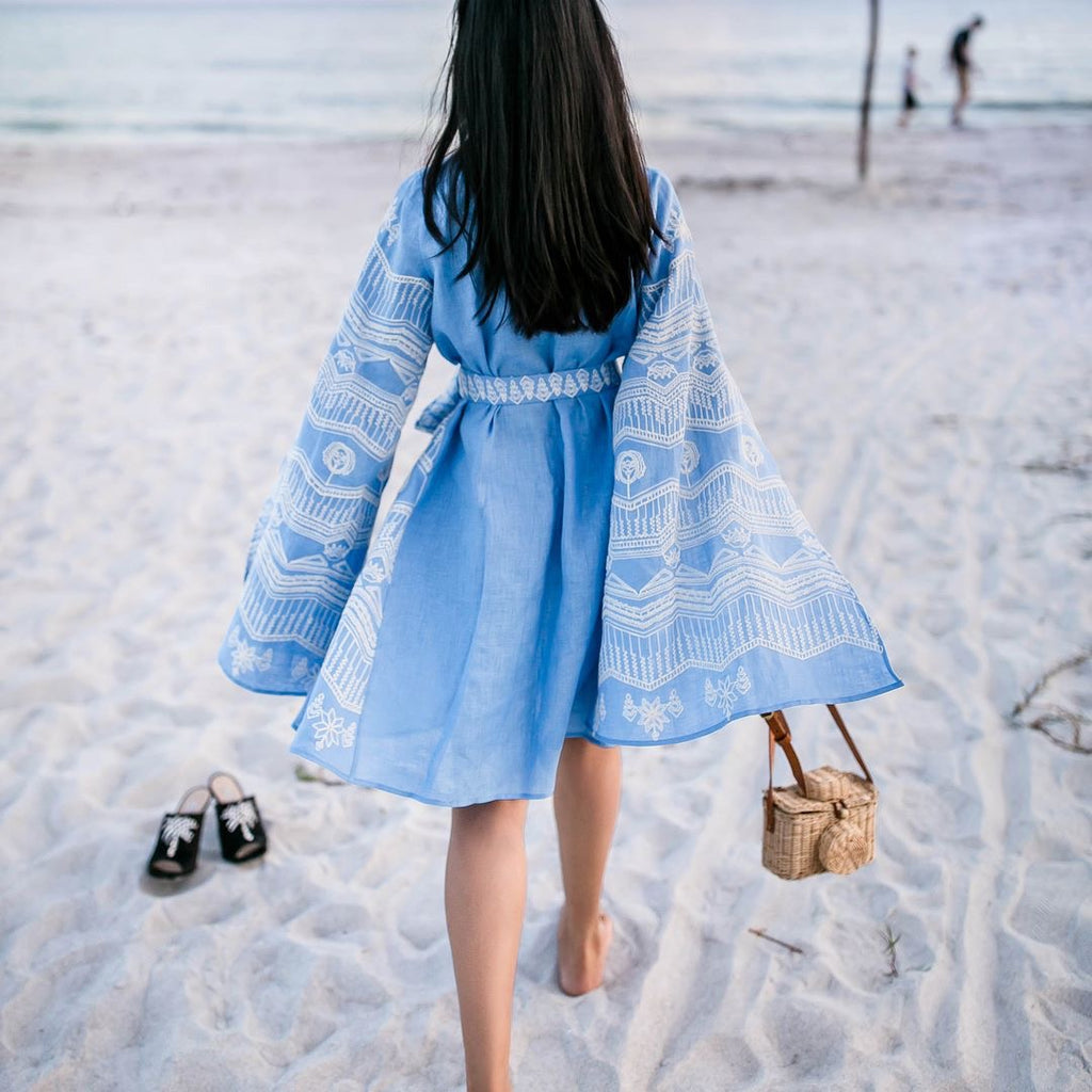 The world looks different when your toes are in the sand...Camera wicker bag